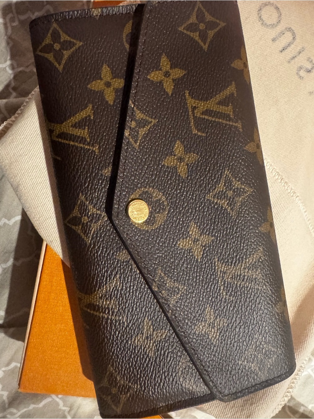 Louis Vuitton Monogram Sarah Wallet in Brown